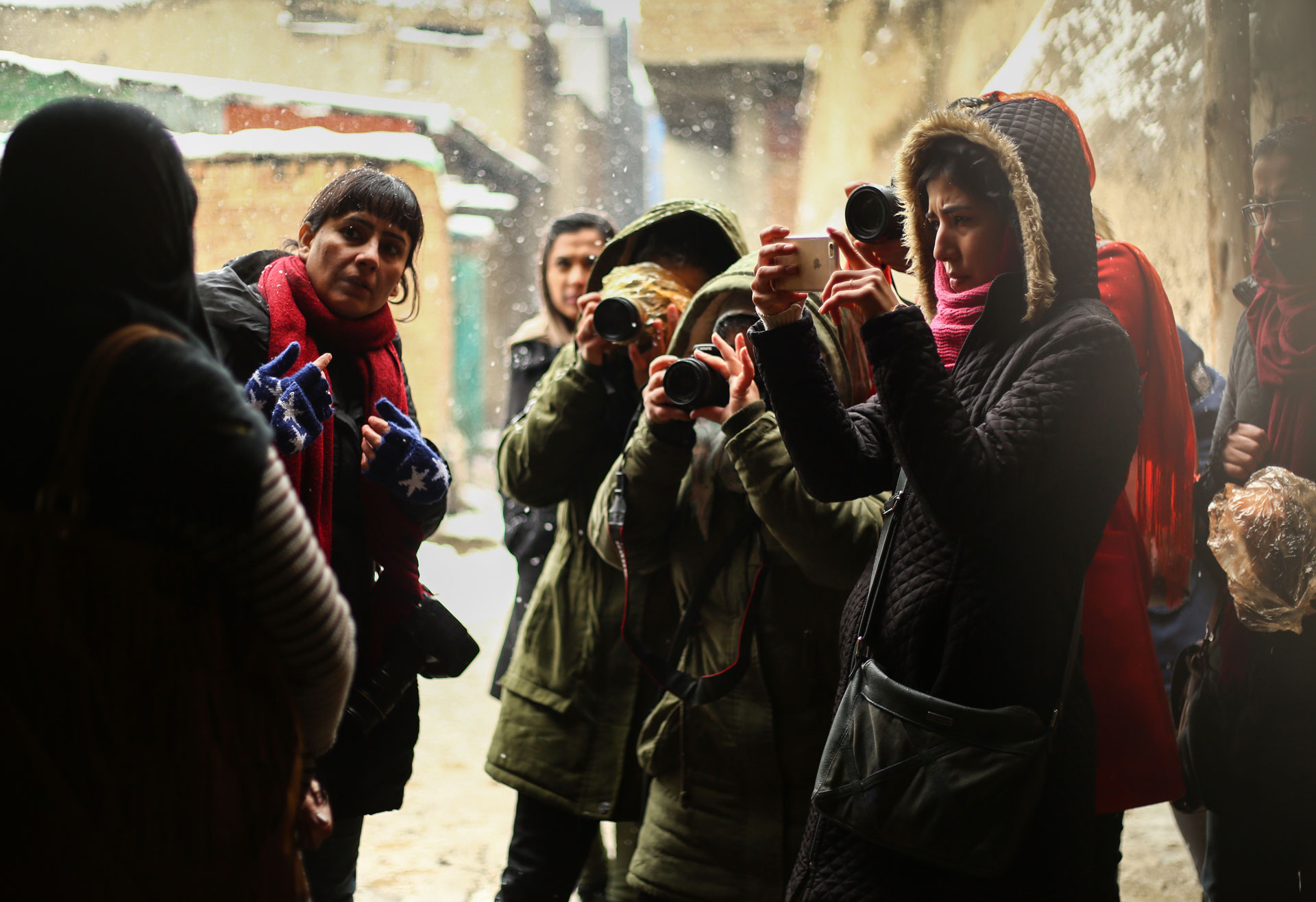 Photography Trainer, Farzana Wahidy, second left, with participants of an exclusive photography training workshop for females during a field exercise – a project conducted by Afghanistan Photographers Association and in collaboration with NAI Media and Internews in 2016. Photo by Nilofar Niekpor